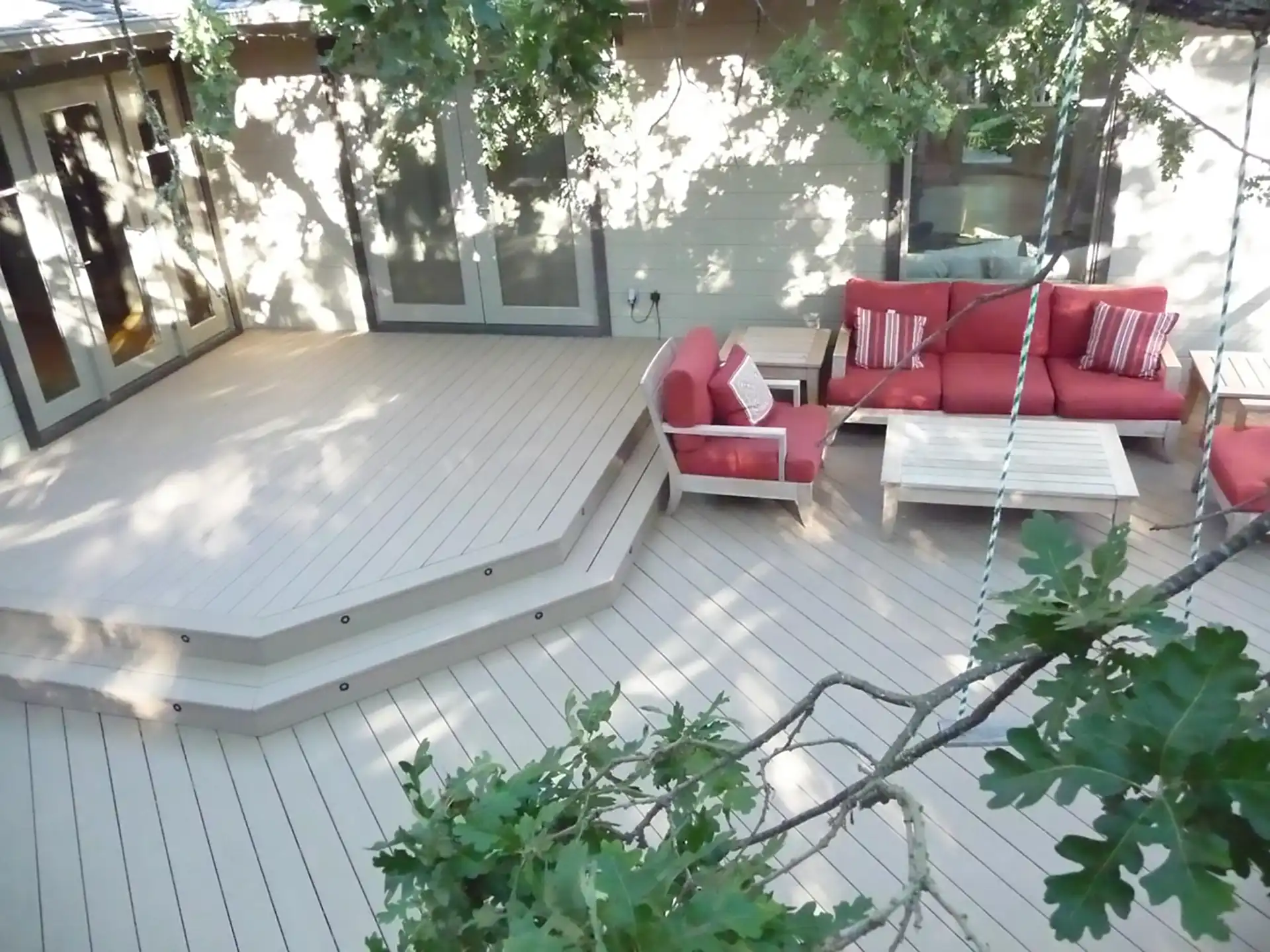 photo of a multi-level deck with different zones used to illustrate the benefits of having a customly designed multi-level composite deck in the San Francisco Bay Area