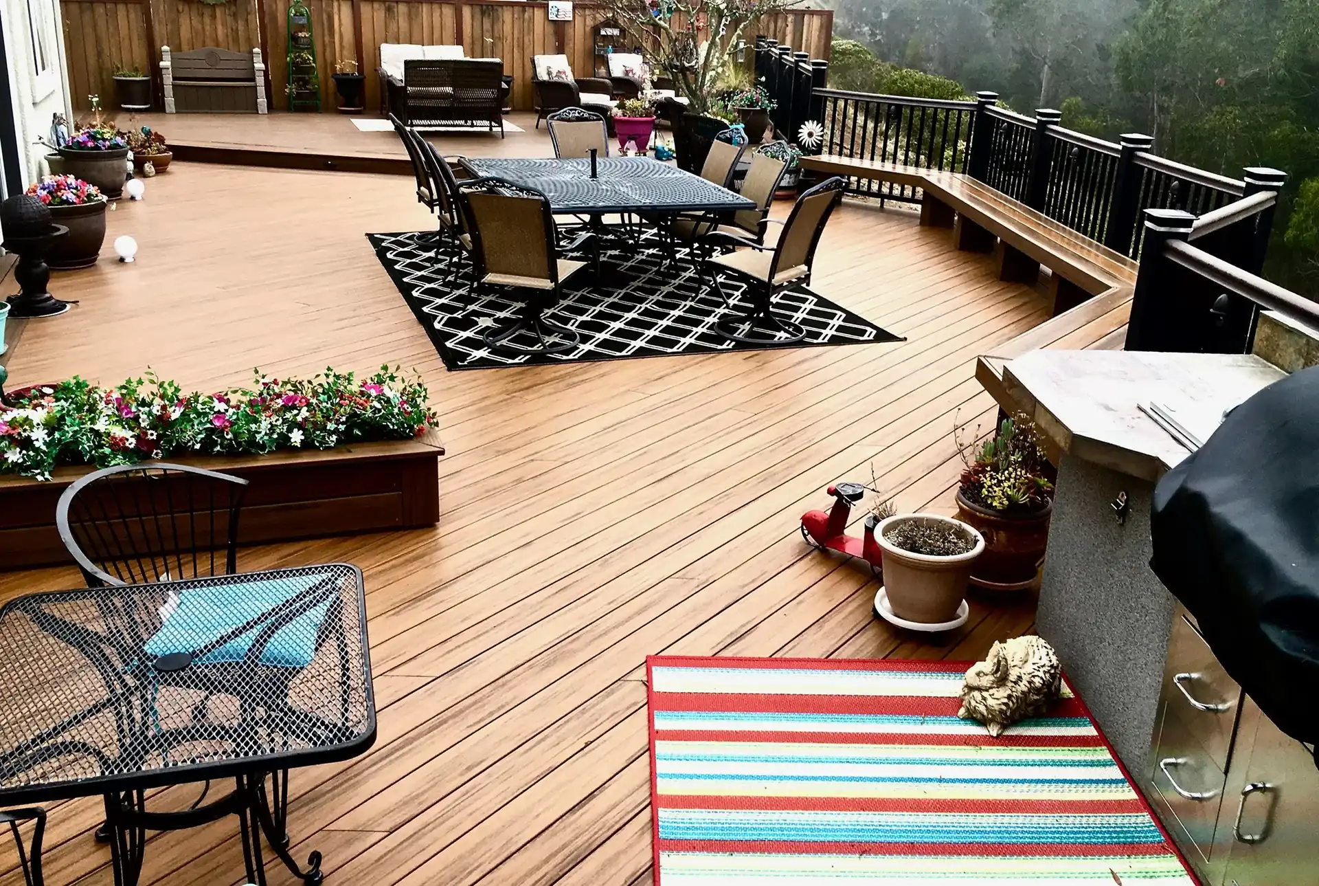 photo of a composite deck with built-in benches, outdoor furniture, planter boxes - Composite Decks Buider near me San Francisco Bay