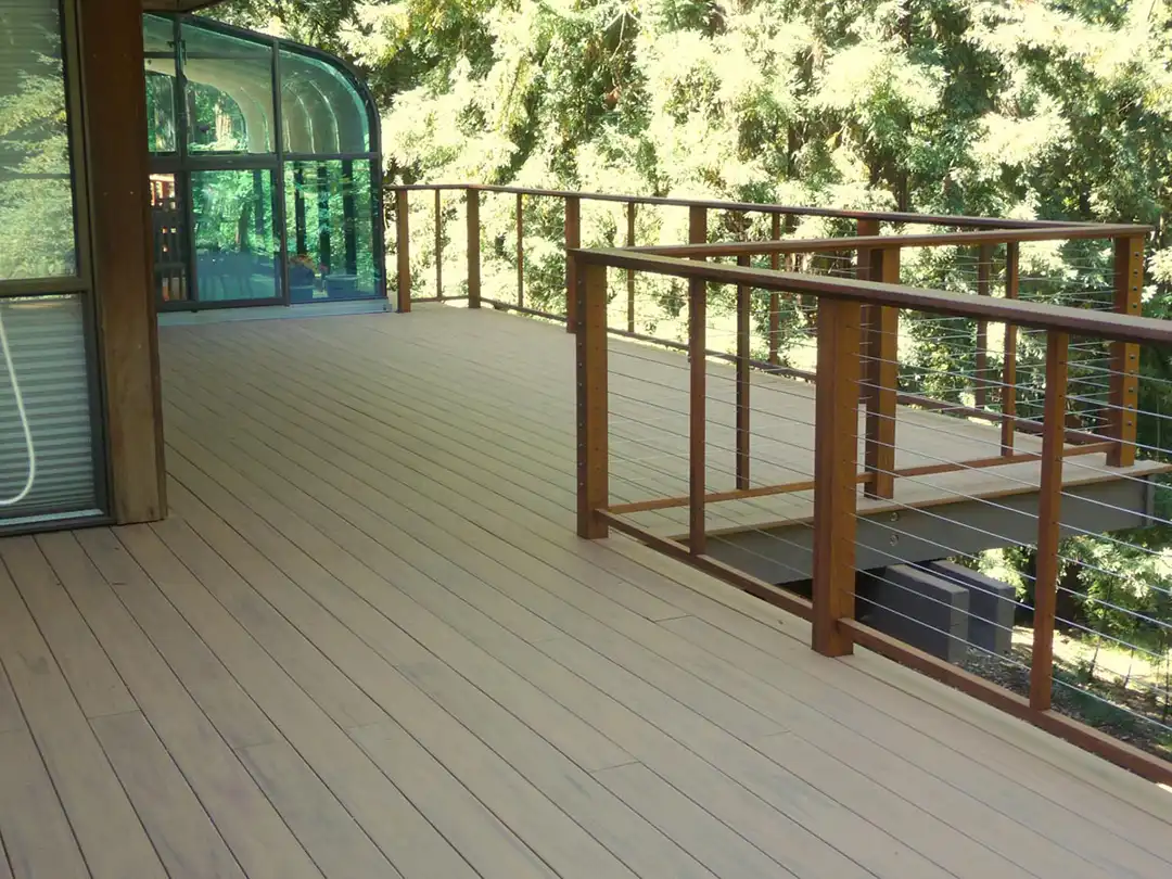 photo of a custom deck with cable railing - Deck building company in the san francisco bay area